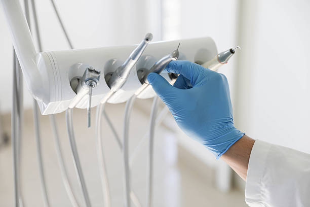 Professional Tooth Extraction technician working in Christmas, FL